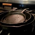 Cast iron pans on top of gas range